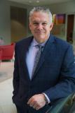 John R. Roland, MD
