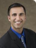 Amir Baluch, MD